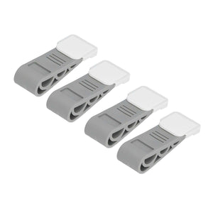 4PCS Stacked Door Stop set in grey rubber and white plastic, with angled wedge bodies and self-adhesive carriers