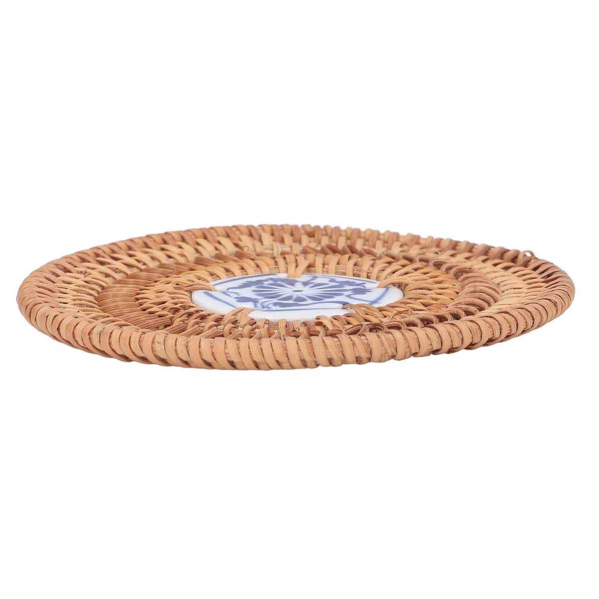 Blue and White Porcelain Coaster with a natural tan woven rattan rim and a blue floral porcelain centre