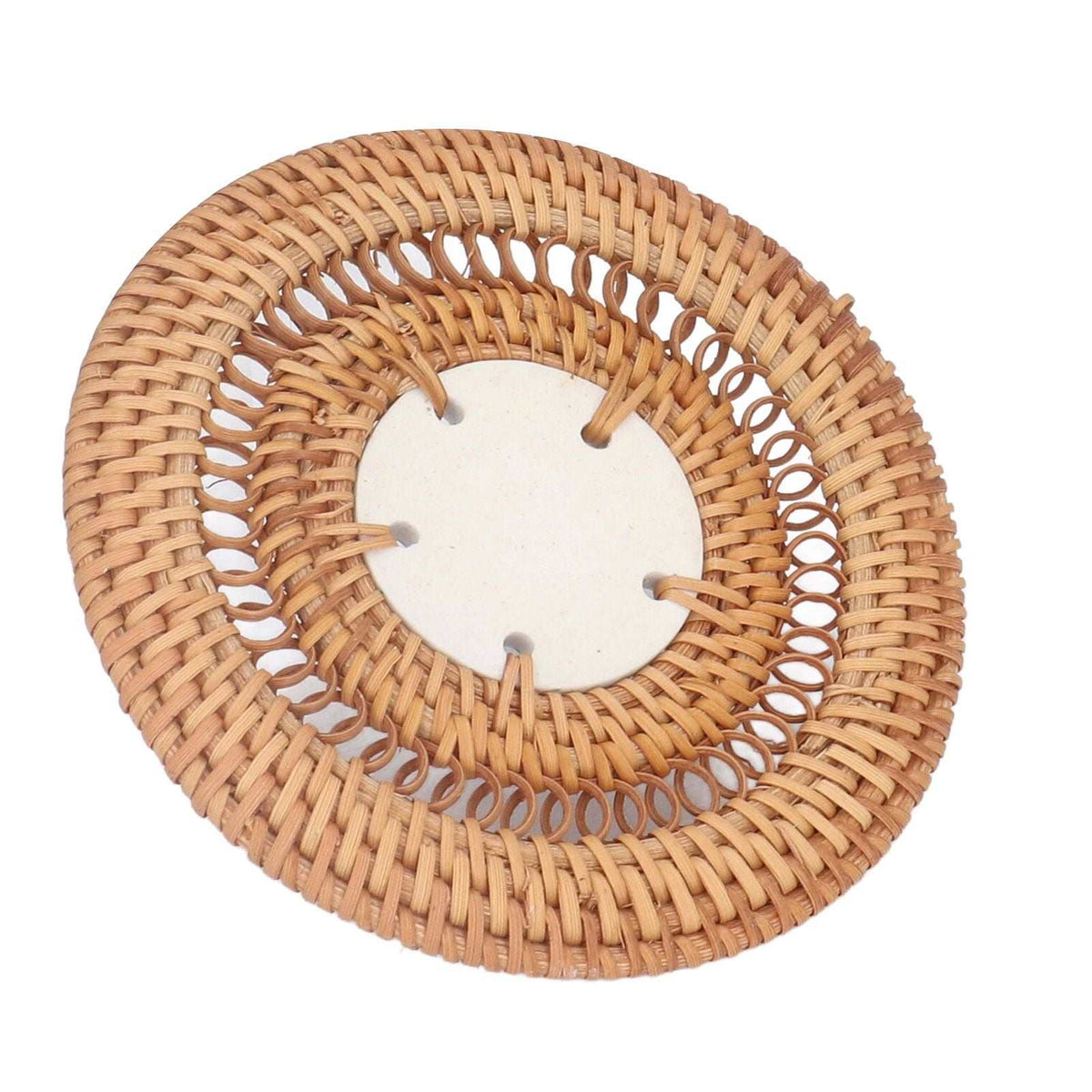 Blue and White Porcelain Coaster with a pale porcelain center and a round natural tan rattan weave border