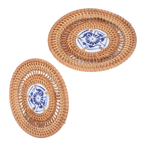 Blue and White Porcelain Coaster with tan woven rattan border and a blue floral porcelain center