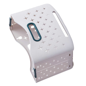 Collapsible Laundry Basket in pale lavender plastic with star-shaped ventilation cutouts, teal-trimmed handle and folding hinges