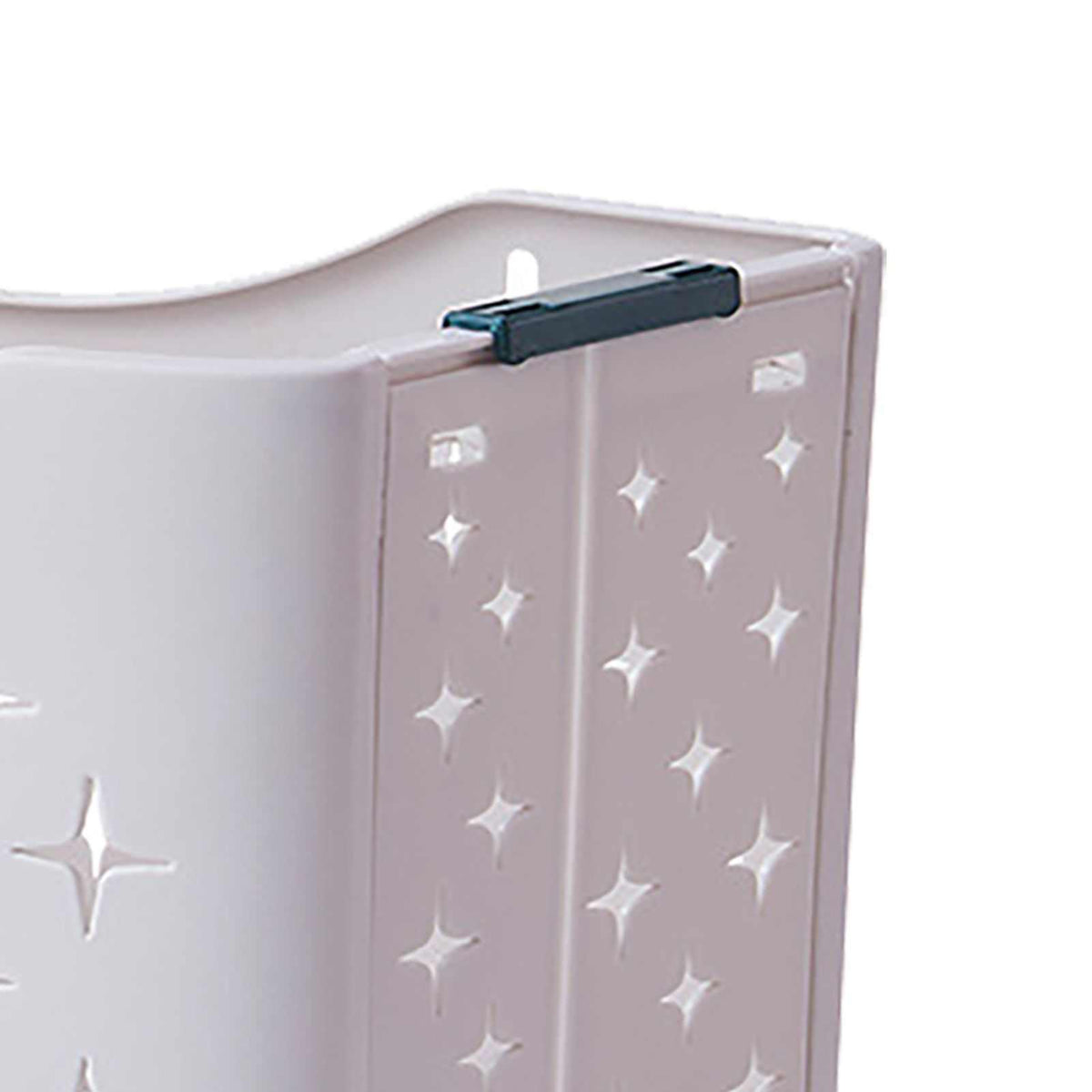 Collapsible Laundry Basket in pale lavender plastic with raised star patterns and a dark folding handle