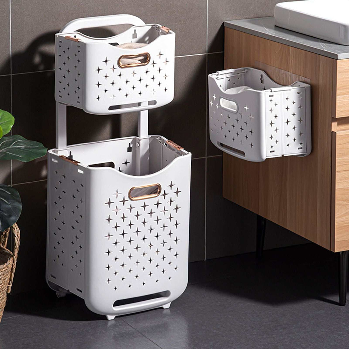 Collapsible Laundry Basket in white plastic with star-shaped ventilation cutouts, copper-tone handles and a fold-flat design