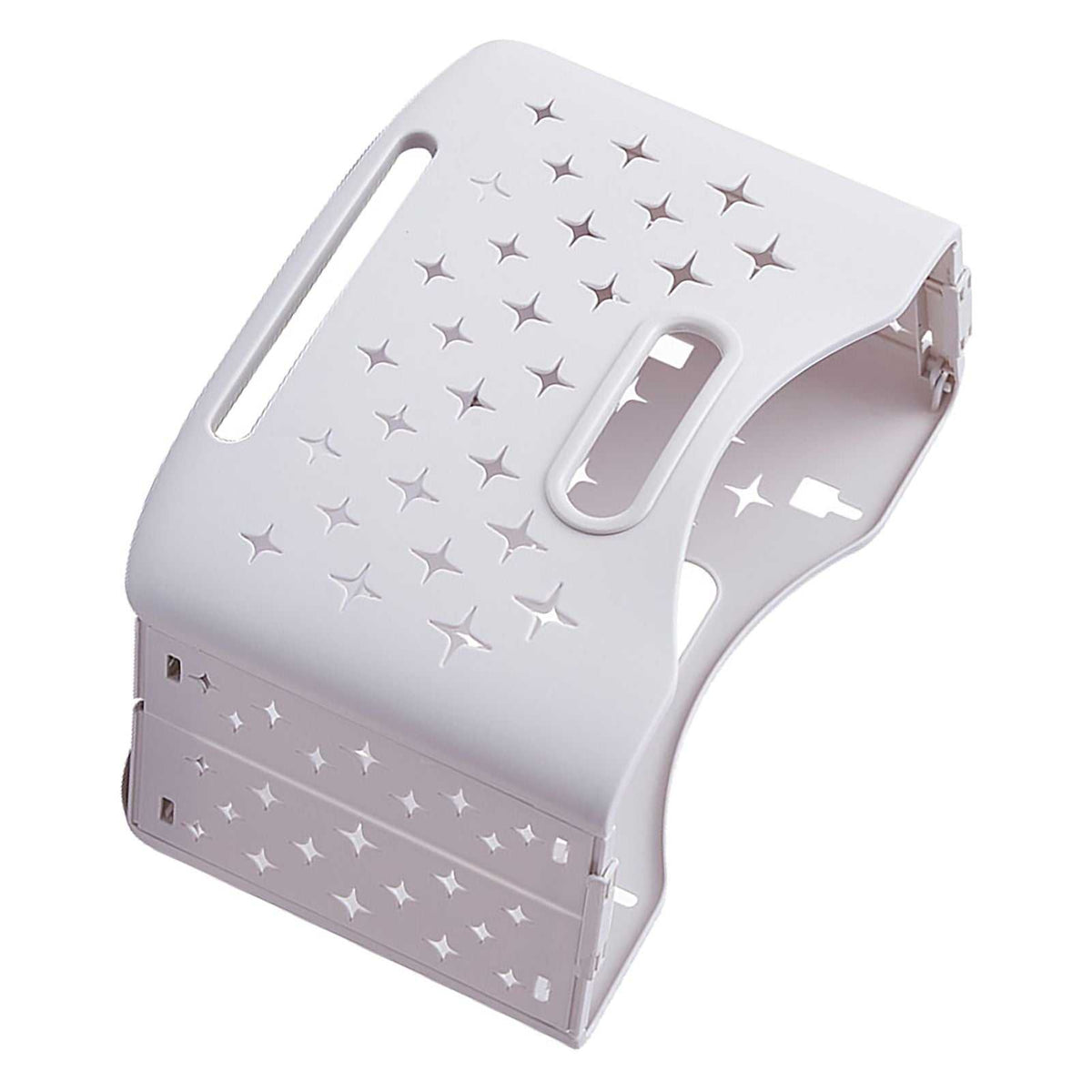 Collapsible Laundry Basket in pale ivory plastic, shown folded with star-shaped ventilation cutouts and built-in handles.