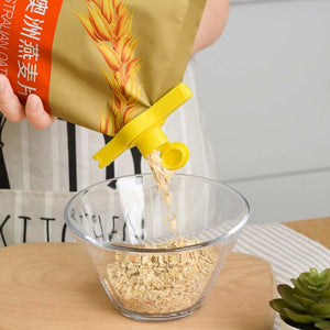 Random Food Bag sealing clip in bright yellow polypropylene, attached to an oat bag with a pouring nozzle