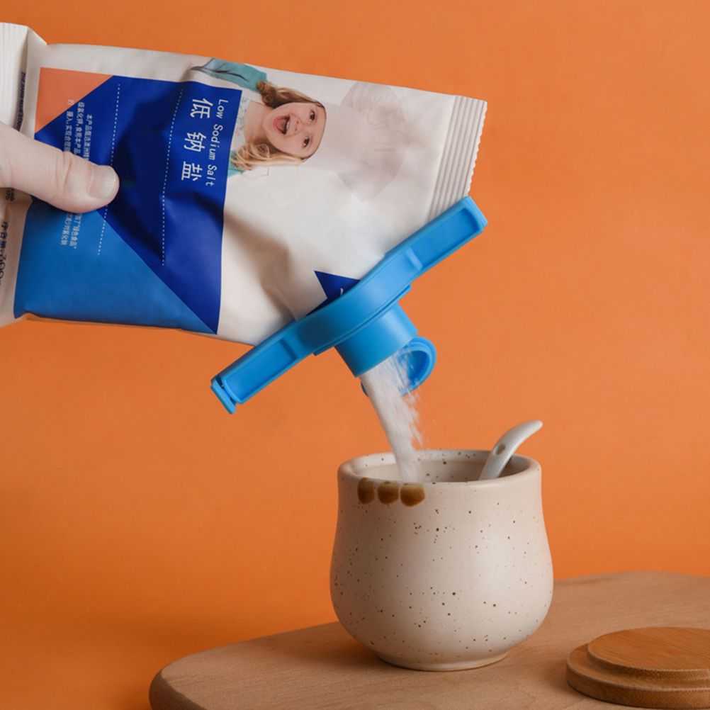 Random Food Bag sealing clip in bright blue polypropylene attached to a packet, with a nozzle pouring contents
