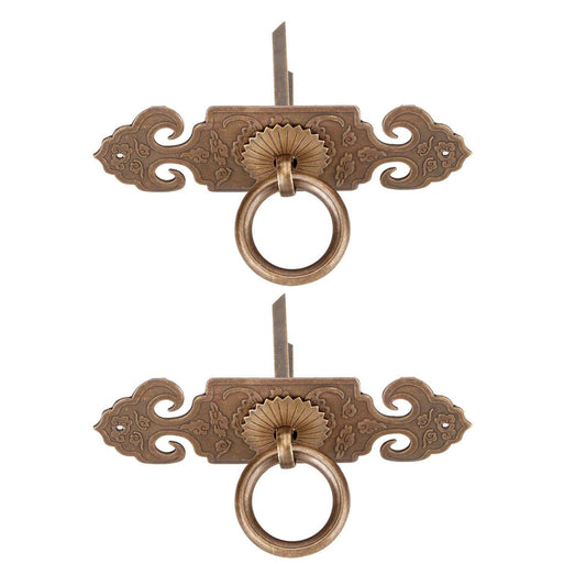 Bat-Shaped Handle pair in ornate antique bronze metal, featuring symmetrical scrollwork plates and circular ring pulls.