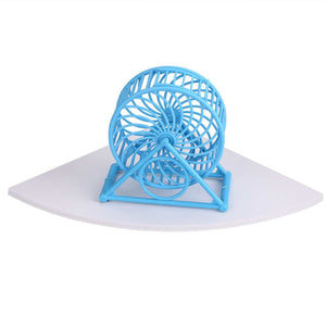 Floating Corner Shelf with a white triangular corner platform and a bright blue circular openwork wheel ornament on top