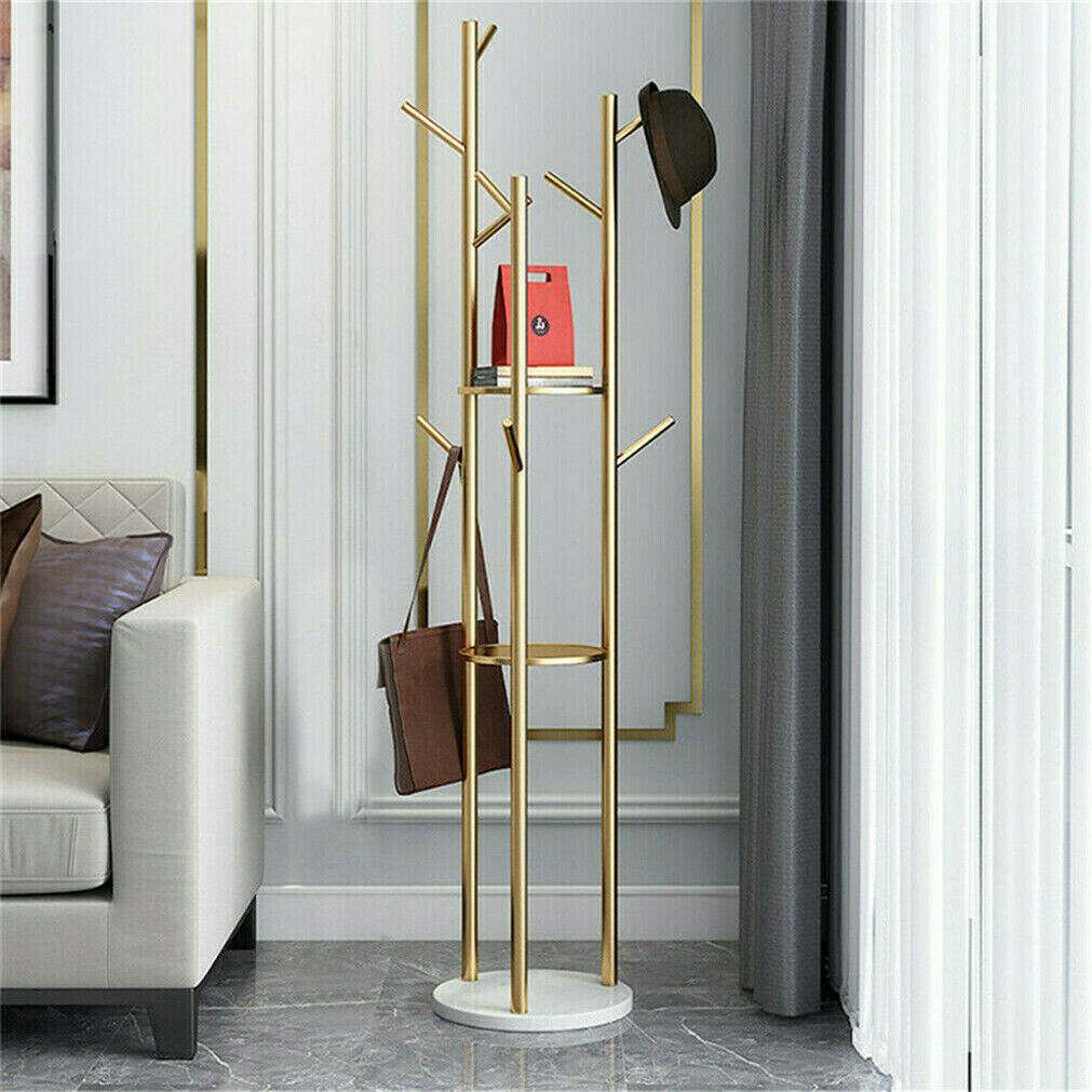 Marble & Metal Coat Rack with a slim gold metal tree frame, branching hooks, round shelves and a white marble base