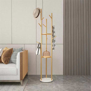 Marble & Metal Coat Rack with slim gold tree-style frame, white marble-effect base and branched hooks holding accessories
