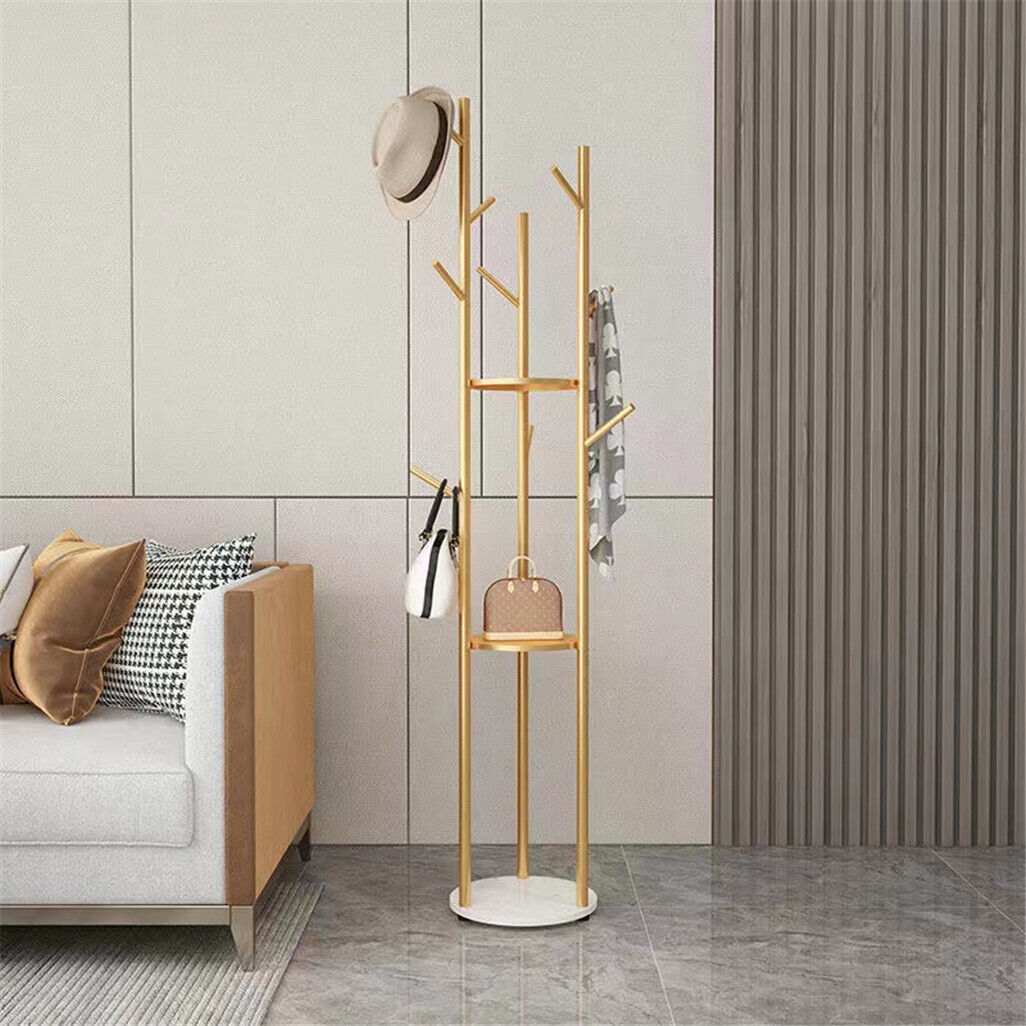 Marble & Metal Coat Rack with slim gold tree-style frame, white marble-effect base and branched hooks holding accessories