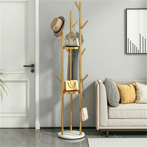 Marble & Metal Coat Rack with a gold tree-frame stand, white round base, branching hooks and attached storage baskets