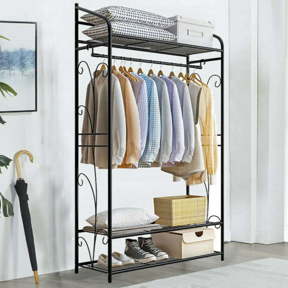 Extra Large Iron Clothes Rack in black metal with a hanging rail, three shelves, curved side details and storage baskets