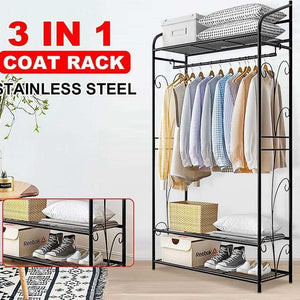 Extra Large Iron Clothes Rack with black metal frame, hanging rod, ornate side scrolls and three storage shelves