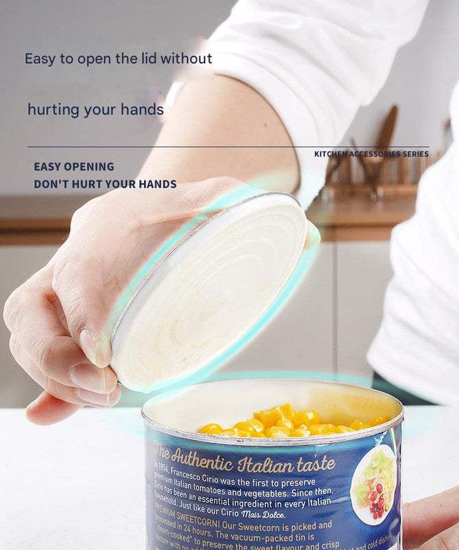 2pc Multifunctional Safe-Cut Can Opener shown lifting a can lid with a smooth edge, revealing yellow corn inside