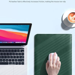 3-in-1 PU Leather Laptop Sleeve shown as a dark green, textured mouse pad beside a laptop, with a hand using a mouse