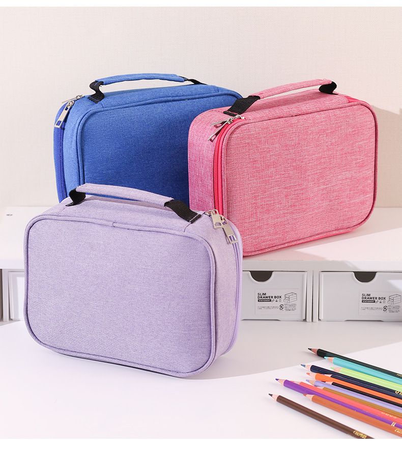 Large Capacity 72-Slot Pencil Case shown as a lavender fabric zippered organiser with a top carry handle