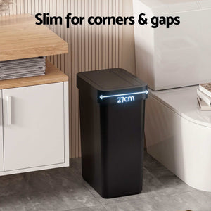 sensor rubbish bin in slim rectangular black plastic with a flat hinged lid and narrow 27 cm width