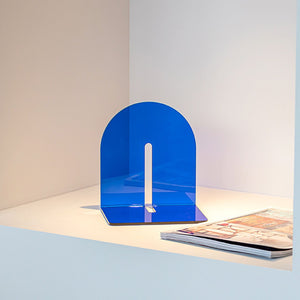 Acrylic Book End in vivid translucent blue acrylic, with a thick rounded upright panel and flat L-shaped base