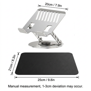 Adjustable aluminum alloy laptop stand in silver with slotted platform and rotating base, shown with a black mouse pad