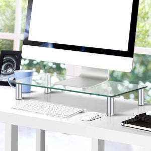 Artiss Monitor Stand Riser with a clear glass platform, silver metal legs and raised design above a keyboard