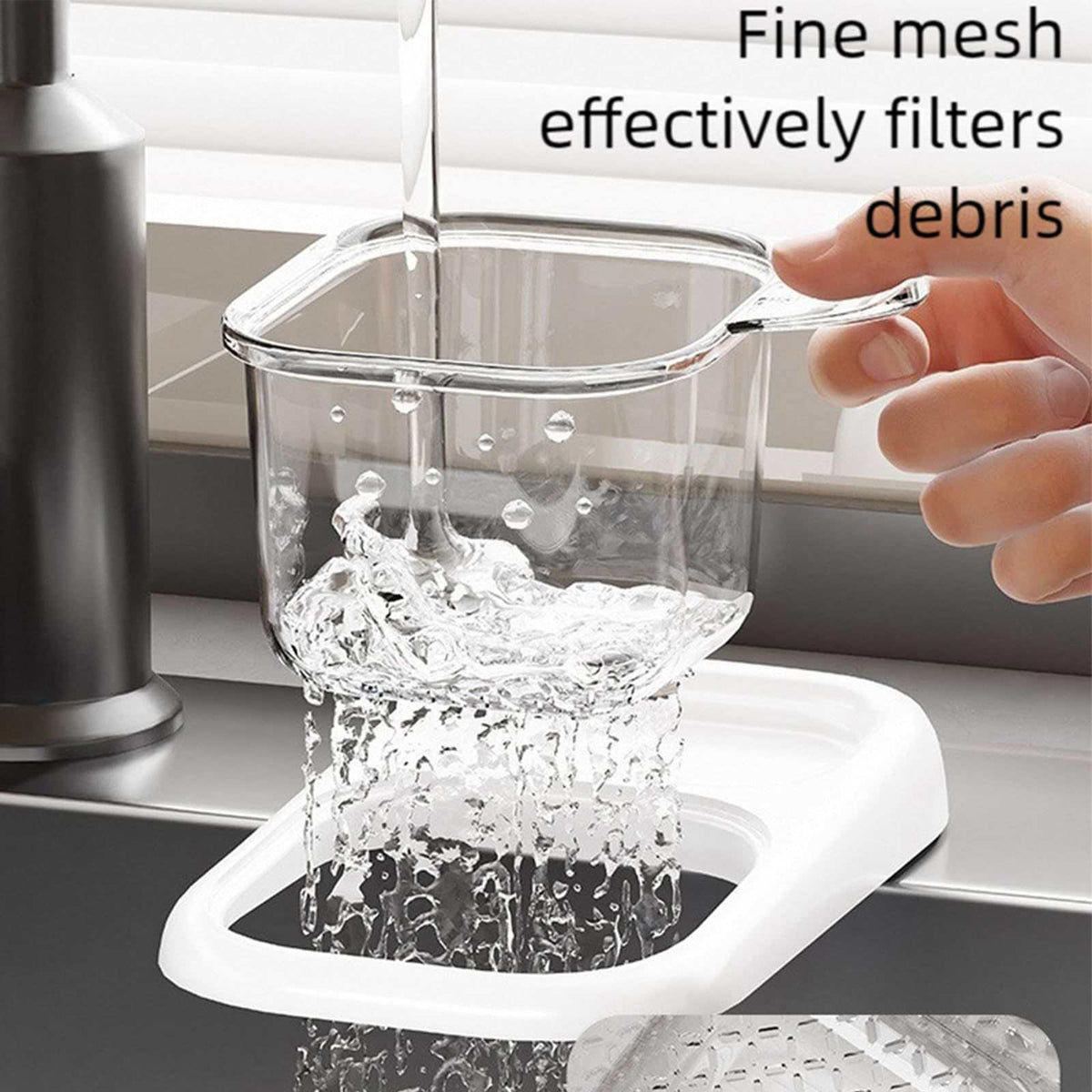 Ash self-designed Sink Drain Basket in clear plastic, with a fine-mesh filter and hooked handle for catching debris