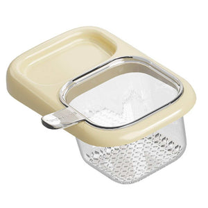 Ash self-designed Sink Drain Basket in cream and clear plastic with a perforated hanging cup and polished metal rim