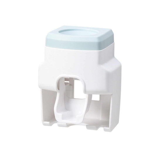 Automatic Toothpaste Dispenser with a white plastic body, pale blue top, and integrated toothbrush holder