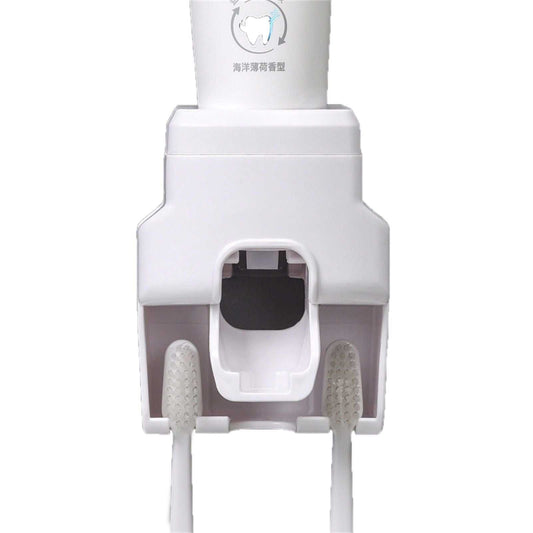 Automatic Toothpaste Dispenser in white ABS plastic, with a central dispensing nozzle and two integrated toothbrush holders