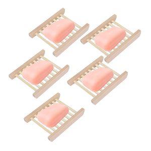 Bamboo Soap Dish set of five natural light tan slatted holders, each displaying a pink bar of soap