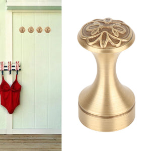 Bathroom Towel Hook Copper shown as a small antique brass-toned wall hook with a flared base and ornate floral top