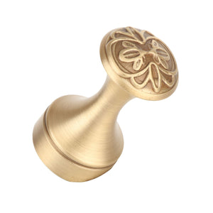 Bathroom Towel Hook Copper with a brushed gold-tone finish, tapered rounded form and ornate floral embossed end