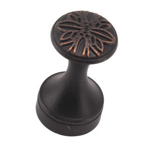 Bathroom Towel Hook Copper with a dark bronze finish, round embossed floral head and flared pedestal base