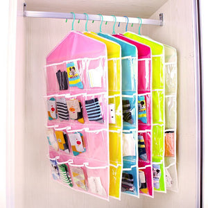 Beige 16 Pocket Hanging wardrobe organiser with clear front pockets, fabric panels and a hanging loop, shown among colourful organisers