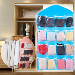 Beige 16 Pocket Hanging wardrobe organiser with transparent pockets and blue trim, shown holding folded clothing