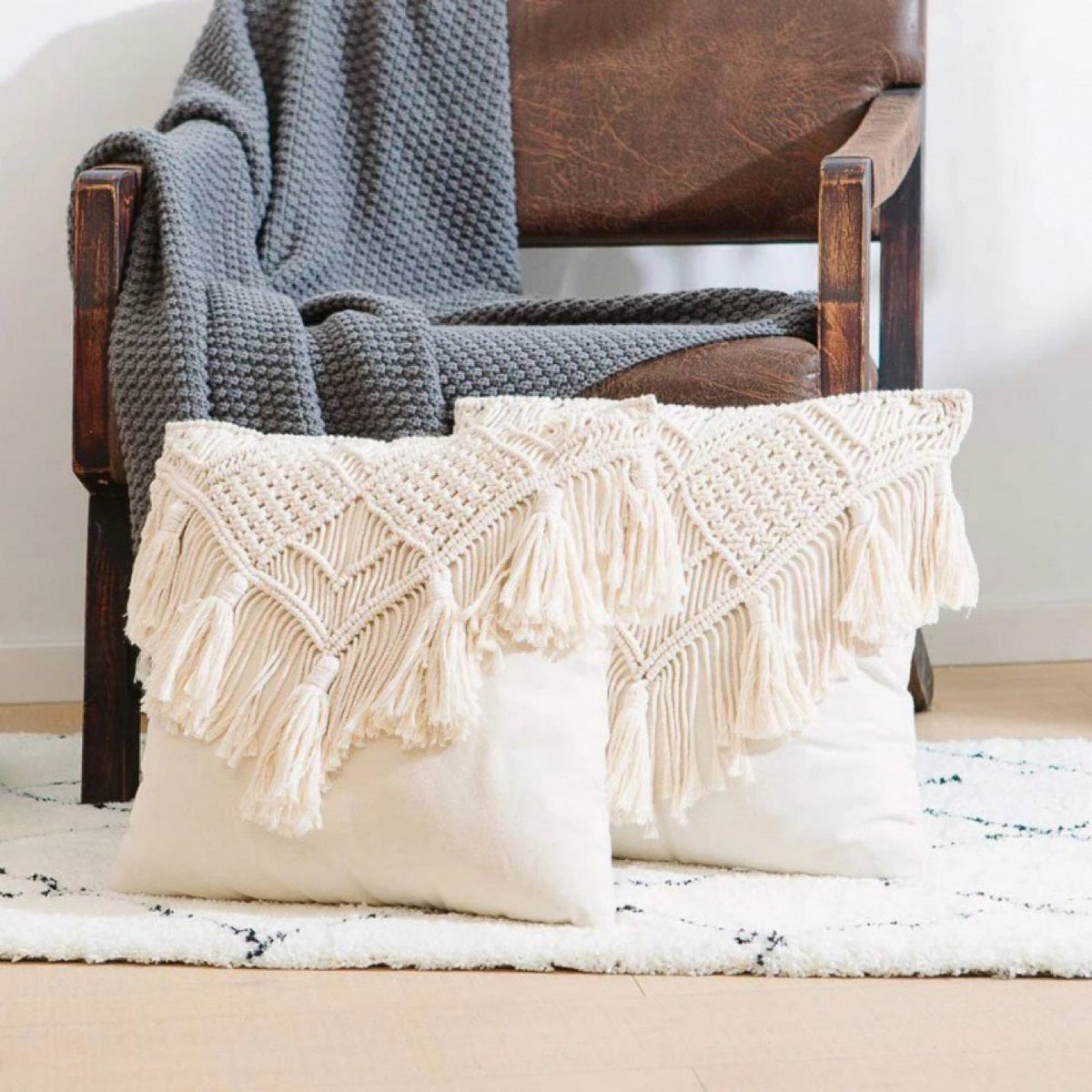 Beige Boho Chic Macrame Cushion Cover with cream cotton-like fabric, diamond knotted trim and long fringe tassels