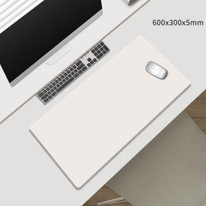 Beige Premium Large Silicone Mouse Pad, smooth pale beige surface with a clean rectangular shape and rounded corners