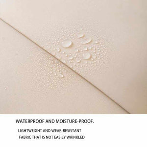 Beige Waterproof Foldable Travel shoe bag fabric with a smooth, finely textured surface and water droplets beading on it
