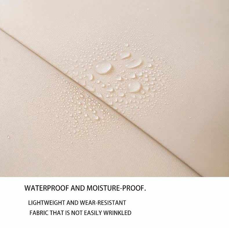 Beige Waterproof Foldable Travel shoe bag fabric with a smooth, finely textured surface and water droplets beading on it