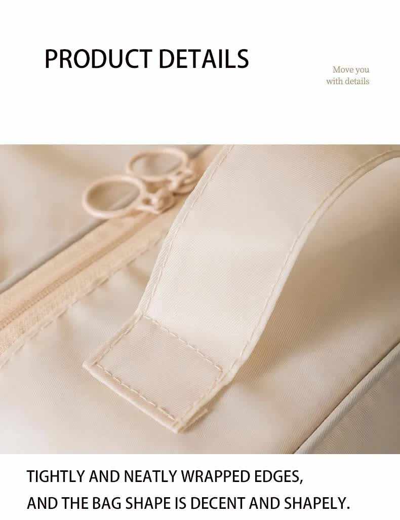 Beige Waterproof Foldable Travel shoe bag with smooth beige waterproof fabric, neat wrapped edges and a reinforced stitched handle tab