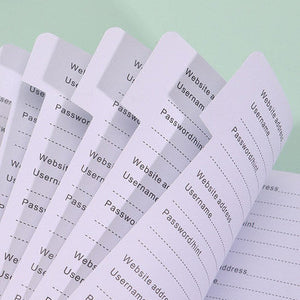 Black Address Book shown open to lined contact pages with pale alphabetical tabs and thickened paper for double-sided writing.