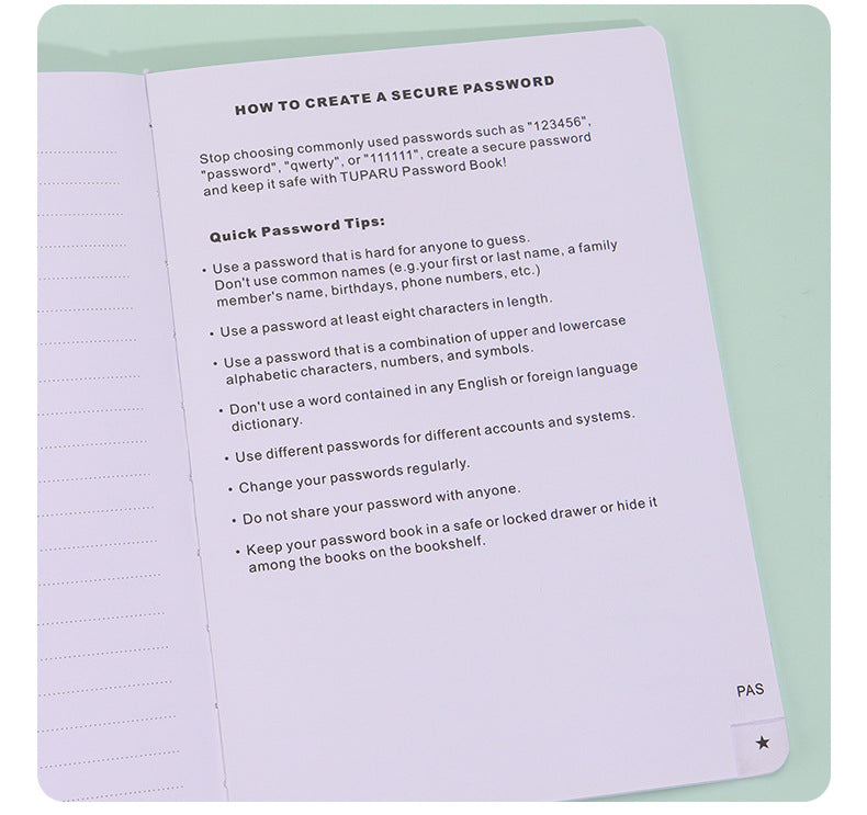Black Address Book open to a printed password security tips page, with a pale lavender page and small star tab.