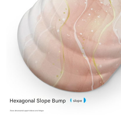 Black Ergonomic Mouse Pad with a pale peach and cream marbled surface, raised contoured wrist support, and hexagonal slope bump design