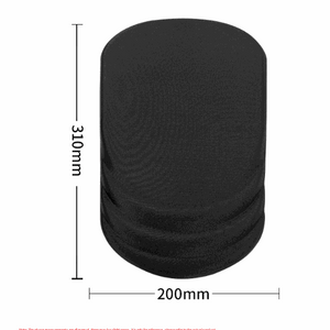 Ergonomic mouse pad in solid black fabric with a raised, contoured wrist rest and rounded edges; no flower pattern is visible.