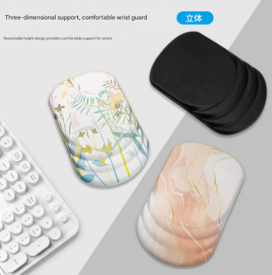 Mouse pad with black cushioned ergonomic wrist rest and two patterned pads in pastel botanical and marble designs; Black Flower Pattern