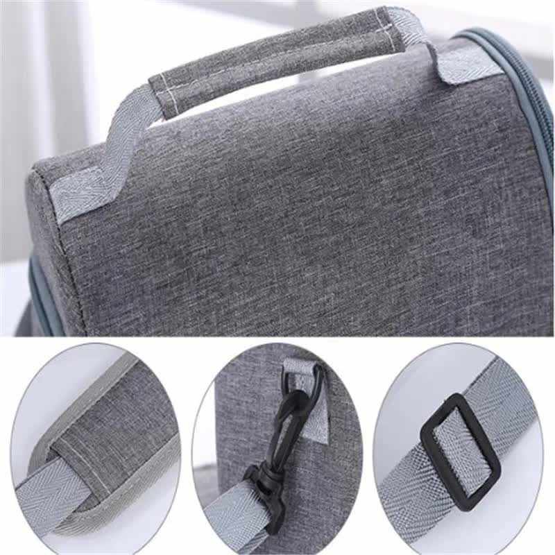 Black Large Insulated Breast Milk Storage Bag in grey woven fabric with a padded top handle, zipper, and adjustable strap clips