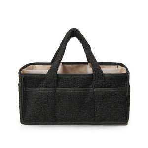 Black Large Plush Nappy Caddy with soft black exterior, beige lining, front pockets and two sturdy carry handles