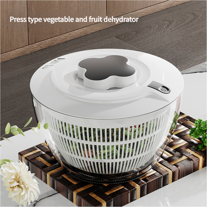 Black Manual Salad Spinner with a white plastic lid, smoky grey pump handle and white slotted basket bowl
