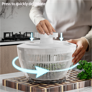 Black Manual Salad Spinner shown as a white plastic bowl with a matching press-pump lid and slotted sides