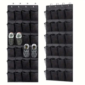 Black Over the Door Shoe Organizer with rows of dark mesh pockets, four metal hanging hooks, and shoes stored inside